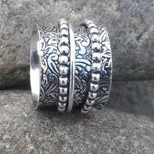 Sterling silver wide band spinner ring